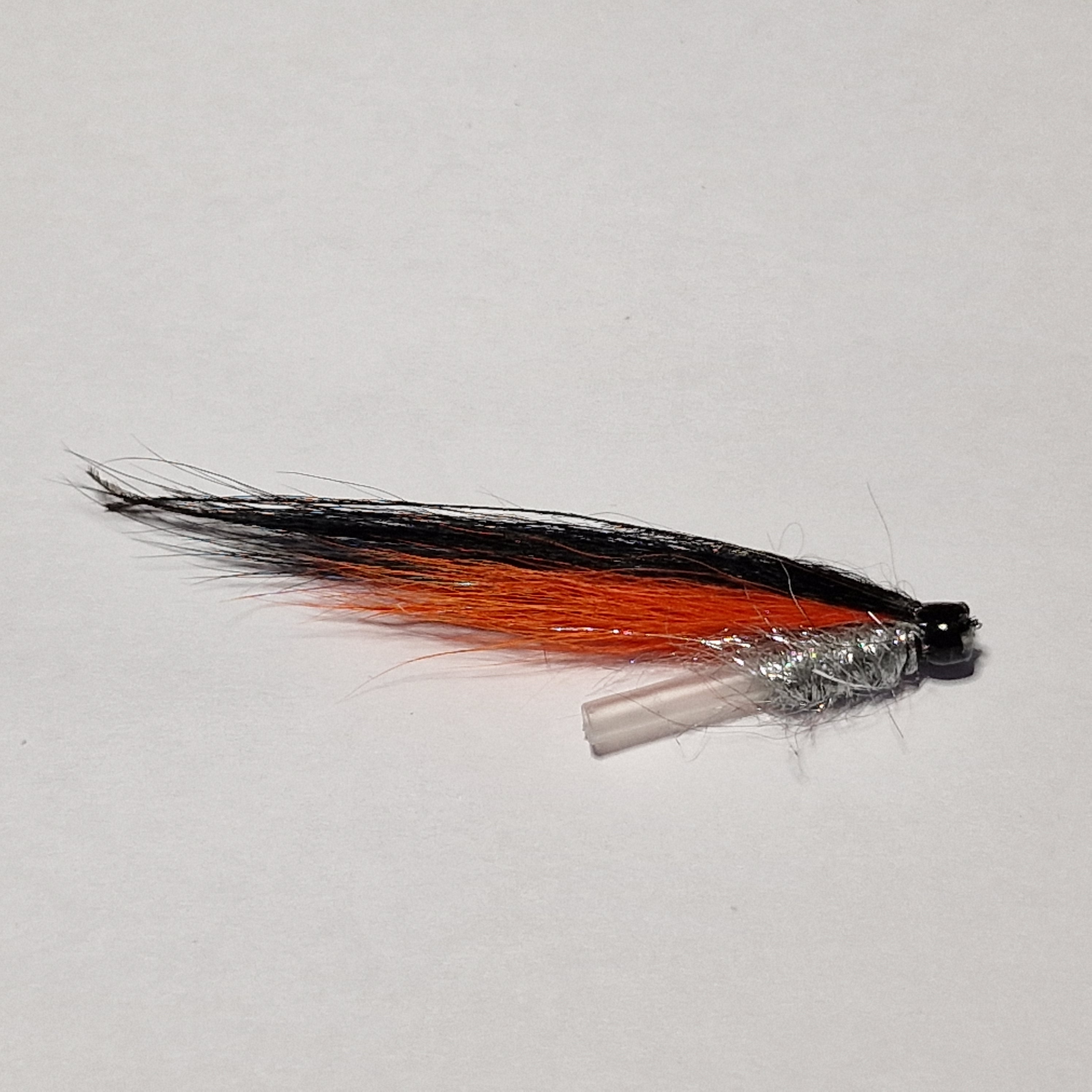 Orange svart tube